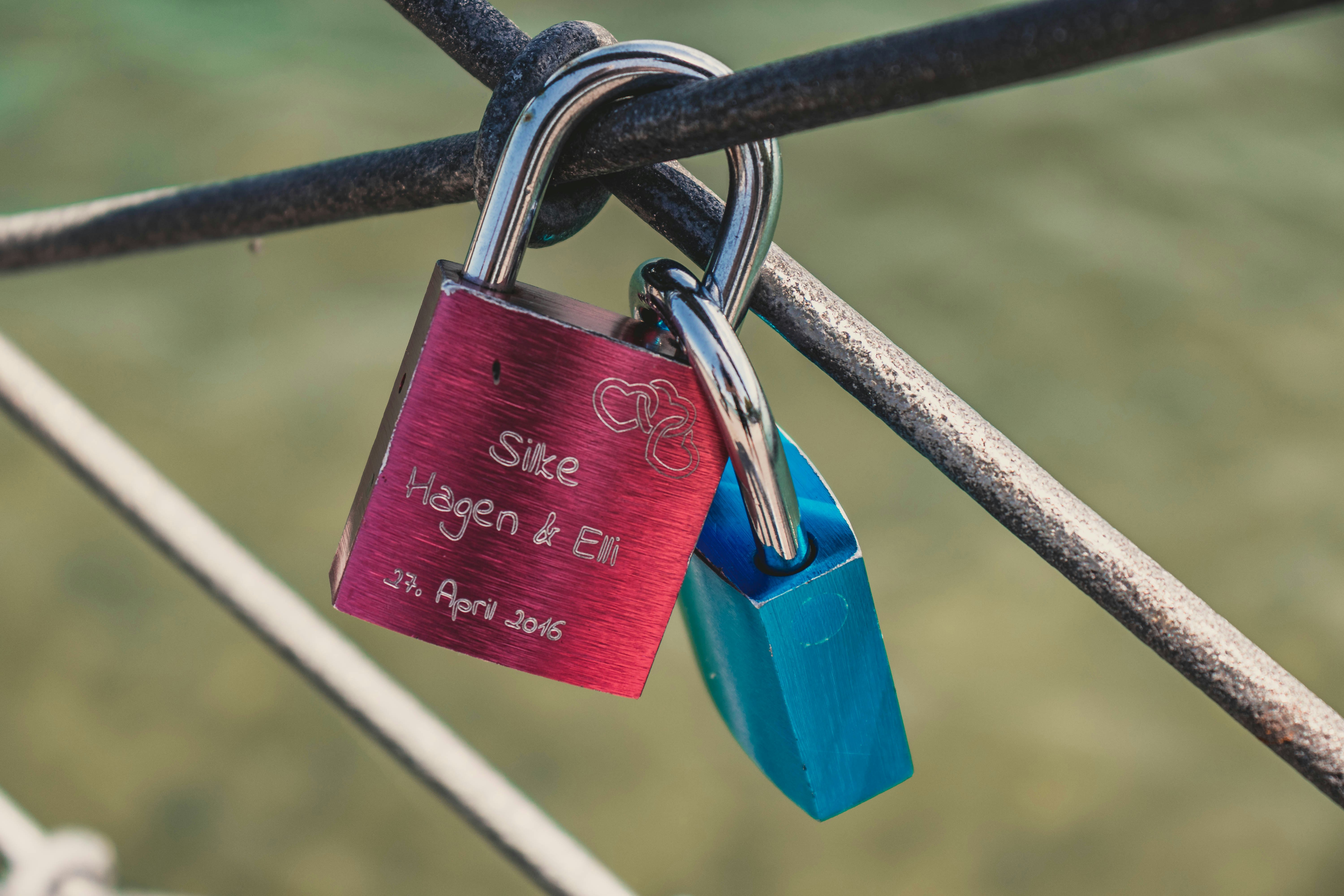 red and blue lock close-up photography